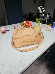 Genuine Coach brown leather ladies handbag.