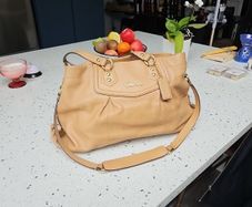 Genuine Coach brown leather ladies handbag.