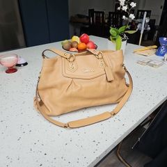 Genuine Coach brown leather ladies handbag.