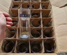 24 Brand new half pint Rockshore glasses