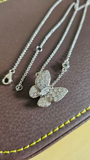 NEW - Silver butterfly necklace and stud earrings