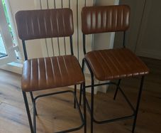 Brown leather bar stools