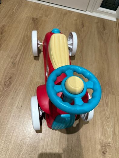 Sit upon toy ride along car