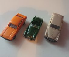 3 Sixties model cars