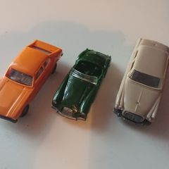 3 Sixties model cars