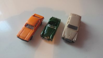 3 Sixties model cars