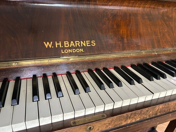 Upright piano and stool