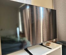 55'' TCL smart TV with tv stand