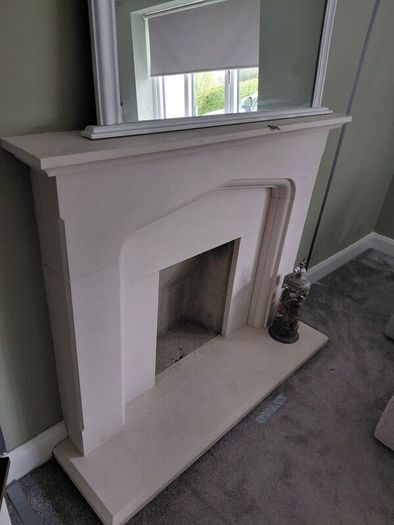 limestone fireplace and hearth