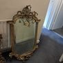 Two distinct antique giltwood mirrors with elaborate French-style ornamentation Image 2