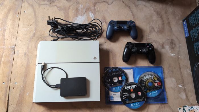 Playstation 4 with games and accessories
