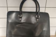 Women's handbag. With compartments.