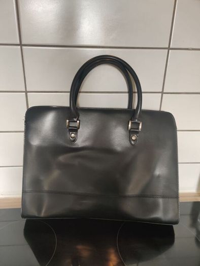 Women's handbag. With compartments.