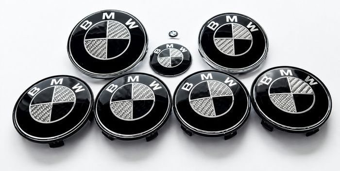 Full set of BMW black carbon fibre caps/badges (E Series) FREE POST