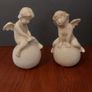 Lovely Vintage Pair of Ceramic Baby Winged Angels Sitting on Globes with a Very Tactile Cream Coloured Crackle Glaze Image 6