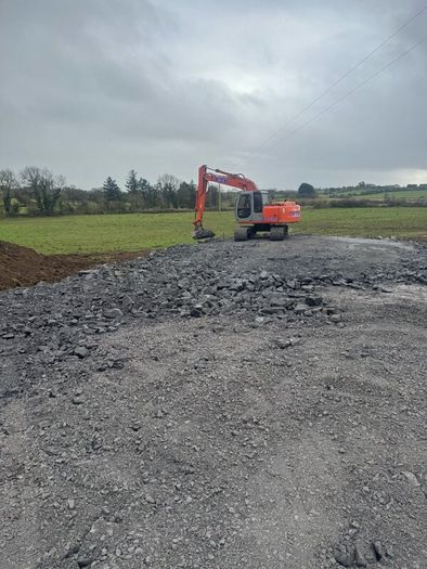 Man and digger for hire