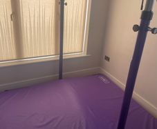 Gymnastics bar and mat