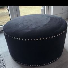 Black pouffe