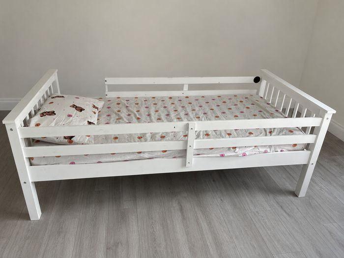 Wooden frame single bed plus mattress