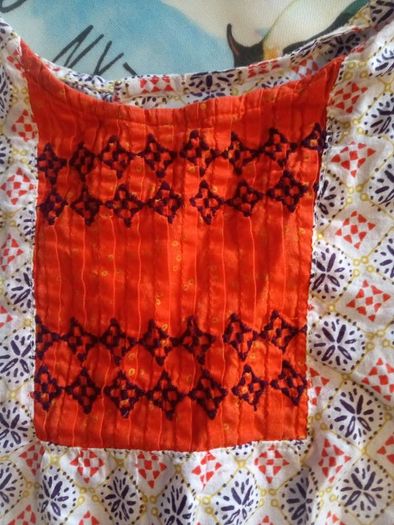 DP...am beautiful orange top with pretty details