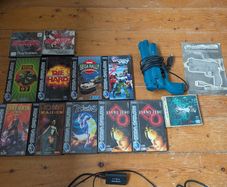 Sega Saturn console bundle with games and Virtua Gun