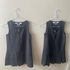 Grey pinafores (as new) age 6-7