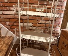 charming Iron shelf on wheels