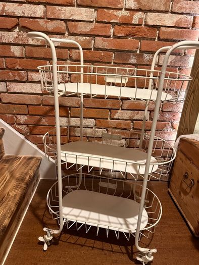 charming Iron shelf on wheels