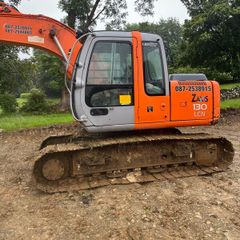 Plant and machinery. Digger,ZX 130