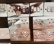 Electric switches and sockets
