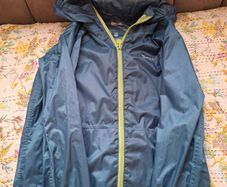 Green waterproof light mountain warehouse jacket 7-8 yrs