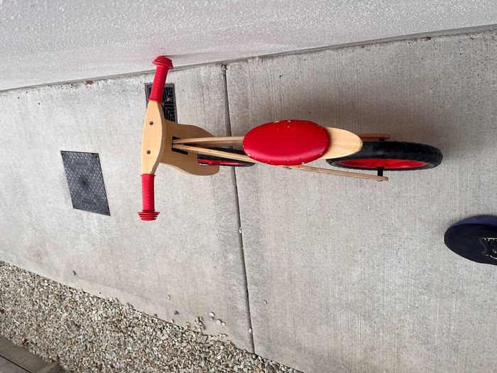 Story wooden balance bike