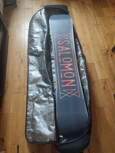 Salomon snowboard with Rossignol bindings in travel case