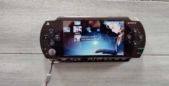 Psp 1000 Modded 64 GB 40 psp games Original battery charger cable