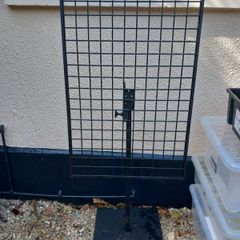Large metal grid on stand