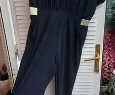 Navy jumpsuit with gold trim waist