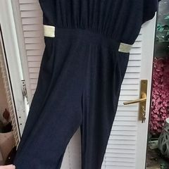 Navy jumpsuit with gold trim waist