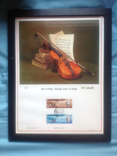 1985 Isle of Man Year of Music Limited Edition Lithographed Print measuring 333mm X 257mm showing Violin with set of Commemorative stamps with First Day of Issue Cancel