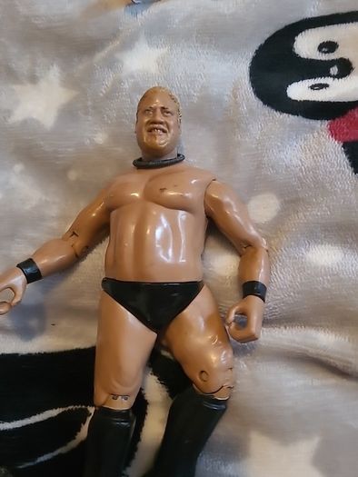 13 WWE wrestling figures