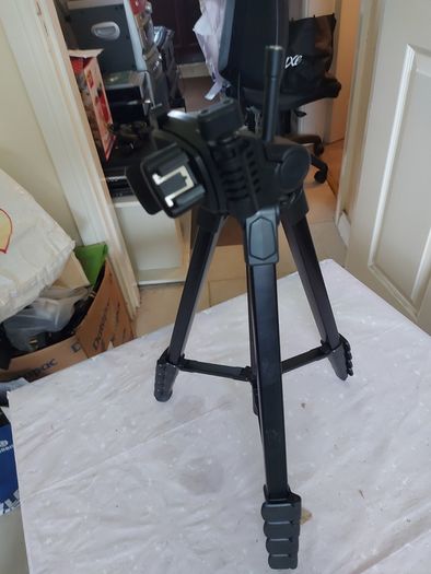Camera Tripod with multiple extensions for increasing height and in excellent condition