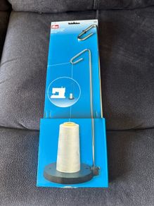 Thread holder for sewing machine