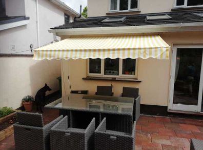 Awning 3x2m rain resistant yellow grey strips new in box .