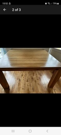 oak , solid table very heavy.  Square . Fits 6