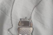 necklace with purse and mirror inside