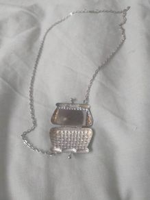 necklace with purse and mirror inside
