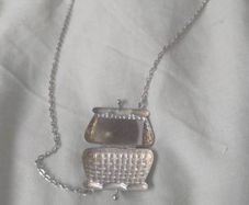 necklace with purse and mirror inside