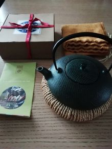 Japanese teapot with a stand and a bag