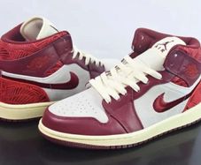 Air Jordan 1 Mid SE "Tiki Leaf" sneakers. The colorway is officially known as Team Red/University Red-Sail-Muslin Size 3