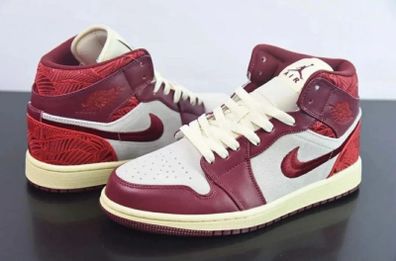 Air Jordan 1 Mid SE "Tiki Leaf" sneakers. The colorway is officially known as Team Red/University Red-Sail-Muslin Size 3