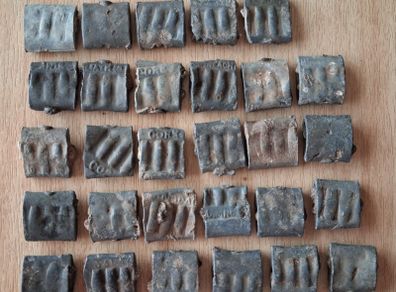 Old Irish post office lead bag seals
